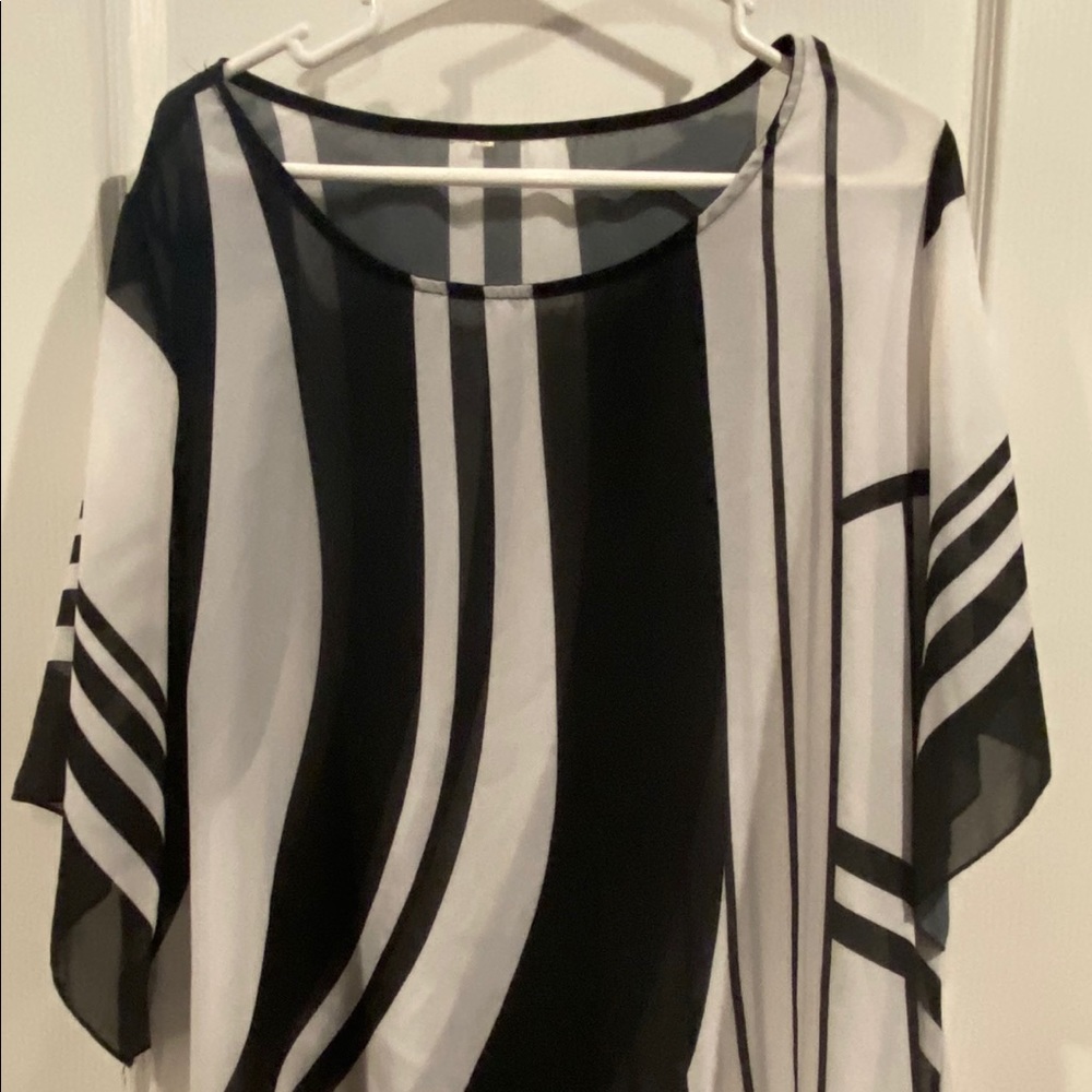 Sheer black and white tunic.